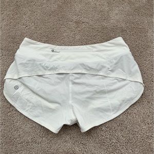 white lululemon shorts